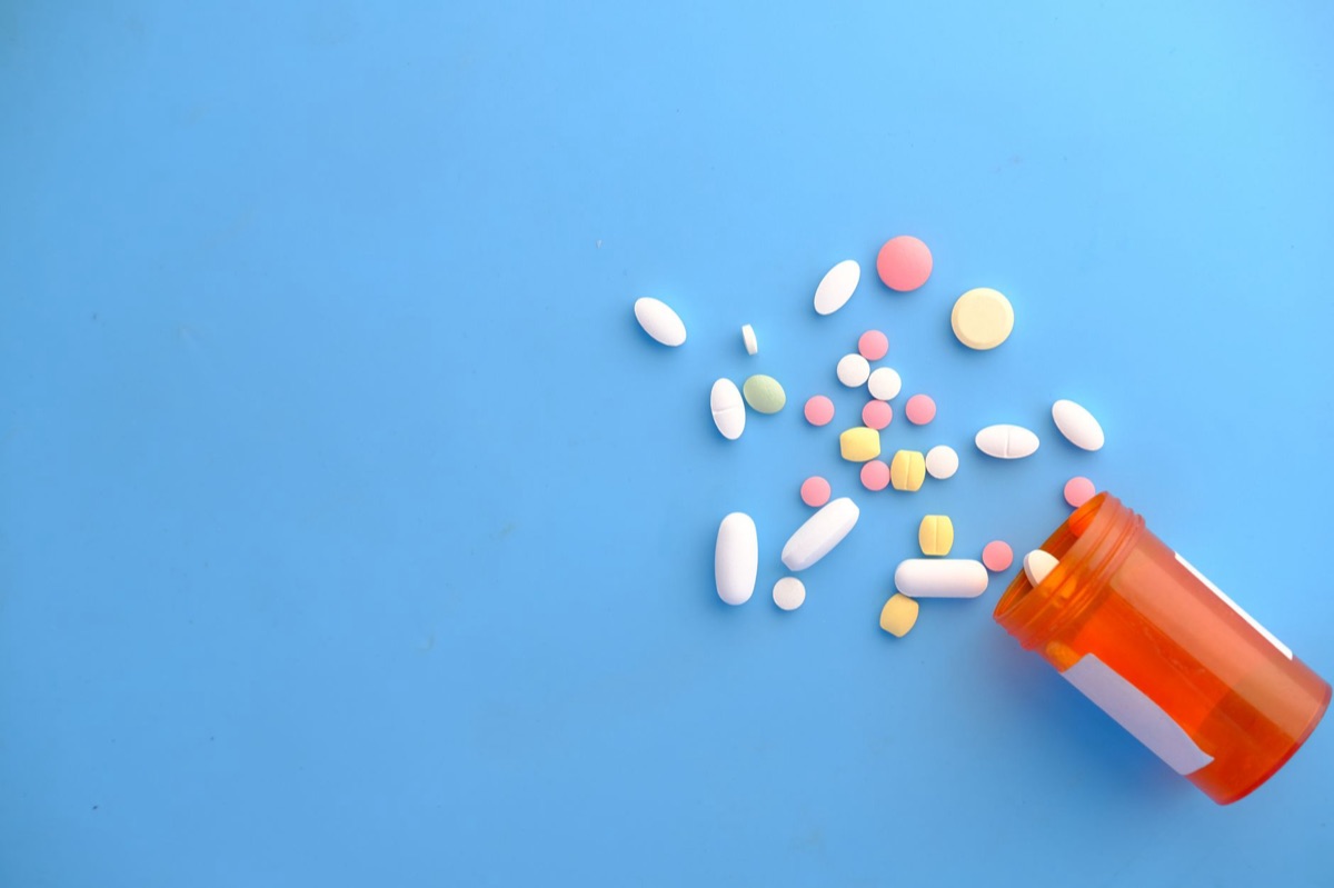 Medicine bottle and pill